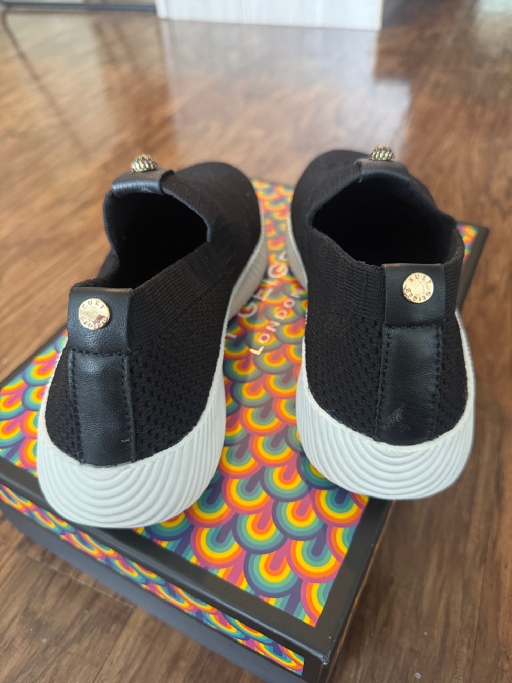 Kurt Geiger Black Knit Slip-On Sneakers with Gold Emblem - Picture 3 of 5